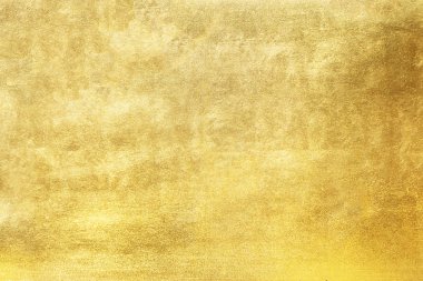 Altın soyut arkaplan veya doku ve gradyan gölgesi.