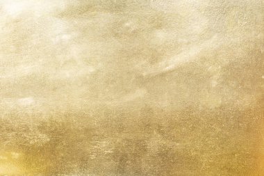 Altın soyut arkaplan veya doku ve gradyan gölgesi.