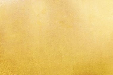 Altın soyut arkaplan veya doku ve gradyan gölgesi.