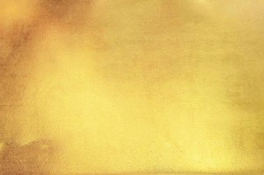 Altın soyut arkaplan veya doku ve gradyan gölgesi.