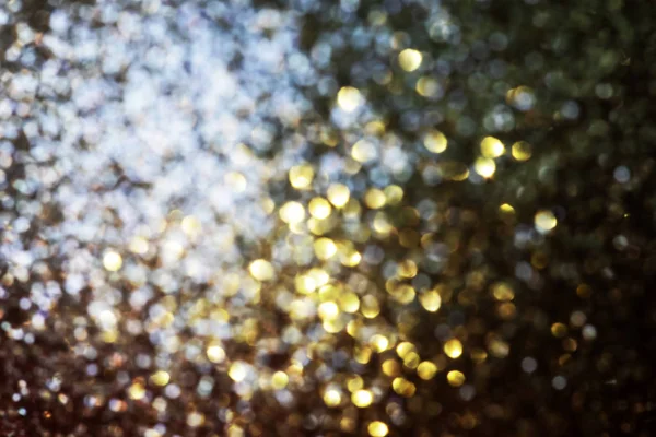 圣诞背景下的金色闪光 — 图库照片