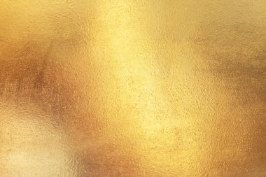 Altın soyut arkaplan veya doku ve gradyan gölgesi.