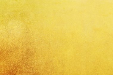 Altın soyut arkaplan veya doku ve gradyan gölgesi.