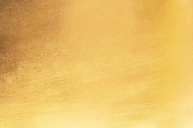Altın soyut arkaplan veya doku ve gradyan gölgesi.
