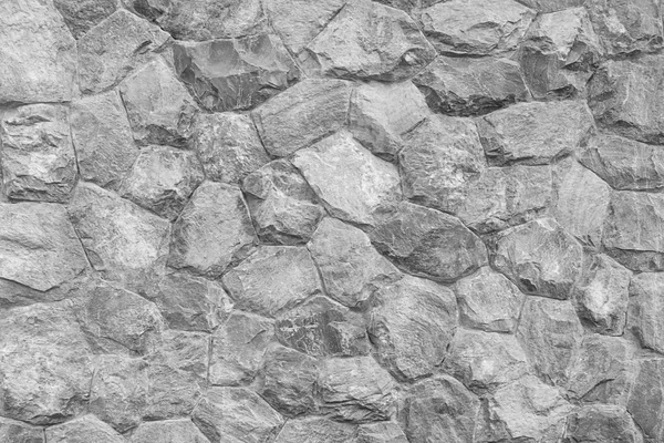 Gray stone wall as a background or texture. Stock Photo