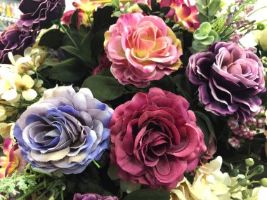 Arka plan için sahte güller çiçek.