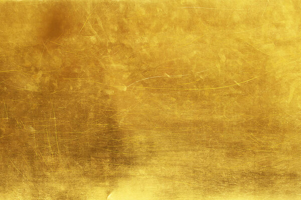 Gold abstract background or texture distress  scratch and gradie