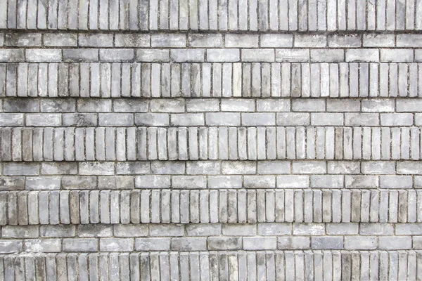 Oude bakstenen muur als achtergrond of textuur — Stockfoto