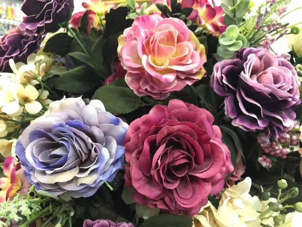 Arka plan için sahte güller çiçek.