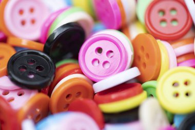 Düğme plastik arka plan için renkli.