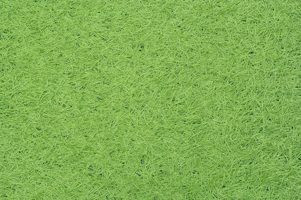 Groene nep gras textuur of achtergrond en kopieer ruimte — Stockfoto
