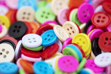 Düğme plastik arka plan için renkli.