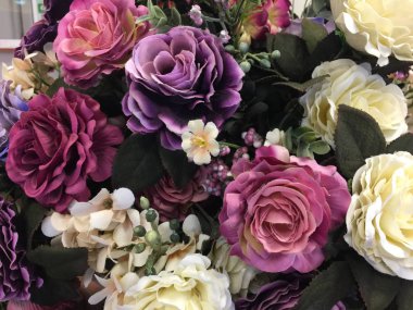 Arka plan için sahte güller çiçek.