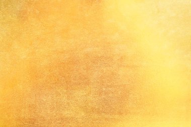 Altın soyut arkaplan veya doku ve gradyan gölgesi.