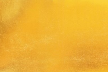 Altın soyut arkaplan veya doku ve gradyan gölgesi.