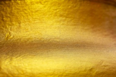 Altın soyut arkaplan veya doku ve gradyanlar yatay gölge şekli