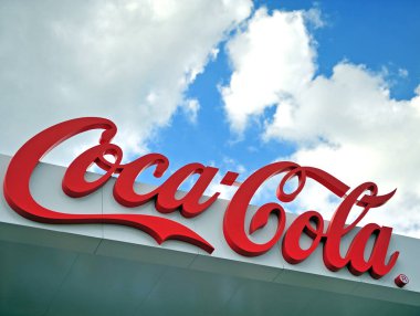 MOSCOW, RUSSIA - JUNE 22: Logo of Coca-Cola company, Moscow on June 22, 2018. Coca-Cola Company is  American corporation, manufacturer and retailer. clipart
