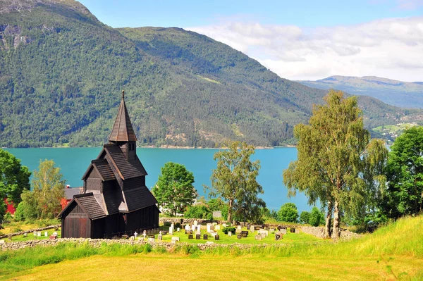 Amazing landscape with old wooden chapel on fjords — Stock Photo, Image