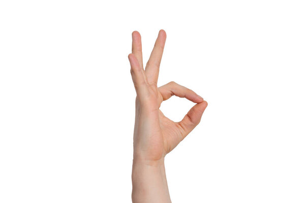 hand gesture OK on an isolated background. Horizontal photo.