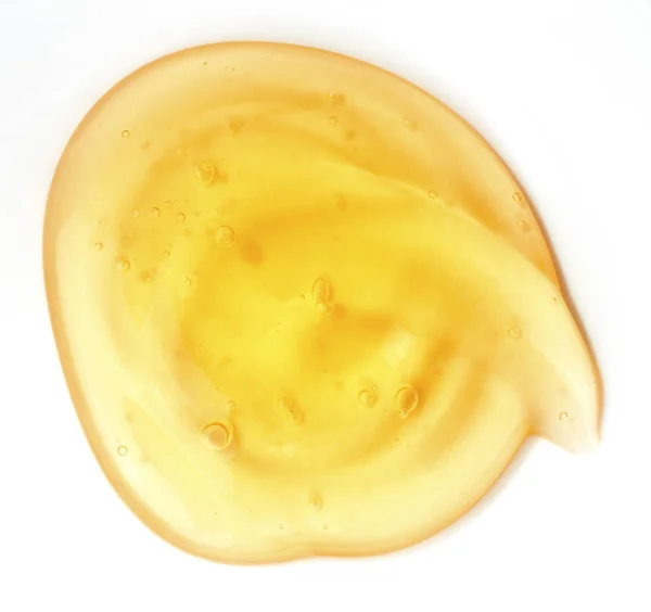 Beyaz arka plan üzerinde izole şeffaf sarı jel
