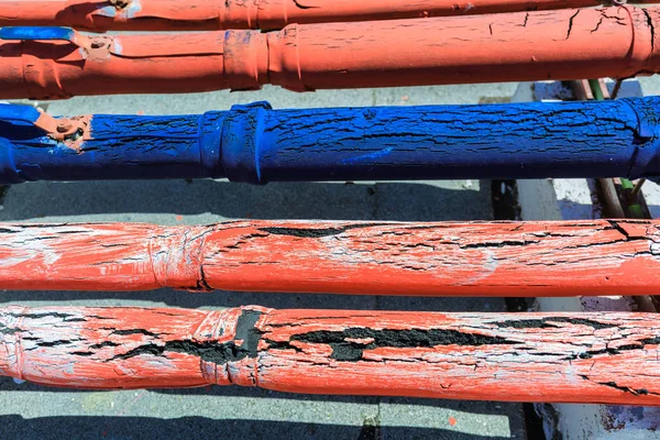 Harika inanılmaz ayrıntılı closeup görünüm eski kauçuk kaplı iletişim borular, soyut kırık