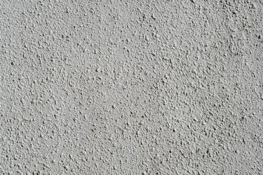 Düz gri dokulu sıvalı duvar. Metin için kopya alanı ile duvar kaba dokulu arka plan