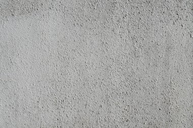 Düz gri dokulu sıvalı duvar. Metin için kopya alanı ile duvar kaba dokulu arka plan