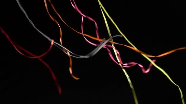 Developing Colored Ribbons Black Background Tapes Beautifully Develop Wind Background — Stock Video