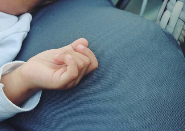 Hand Sleeping Child Blue Sofa Background — Stock Photo, Image