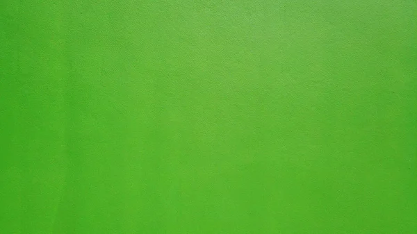 Lime green color cement wall for any design texture background.