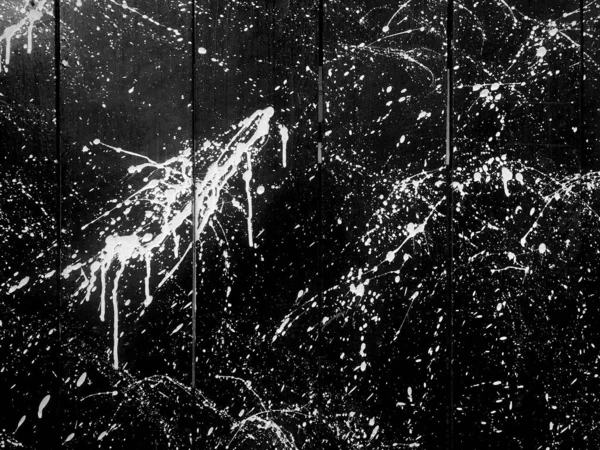 balck panel ahşap duvar backgorund beyaz sıçrama mürekkep boya.