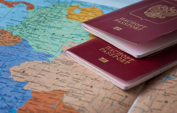 Travel and tourism concept with passport travel documents on world map background. — Stock Photo, Image