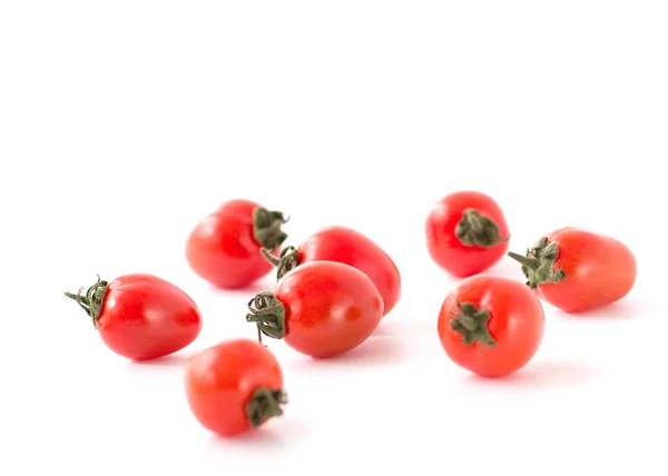 The small cherry tomatoes isolated on a white background — Stock Photo, Image