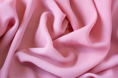 Arka plan ve tasarım için pembe kumaş dokusu, ipek veya keten güzel desen