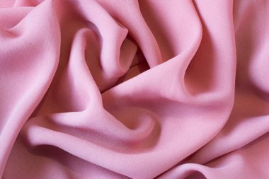 Arka plan ve tasarım için pembe kumaş dokusu, ipek veya keten güzel desen