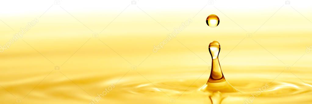 Pure Golden Oil Splashing Into Puddle