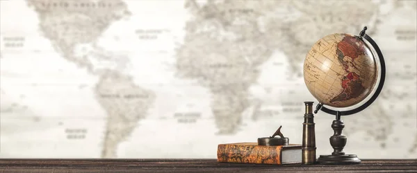 Ancient old globe on the vintage map background - Travel Concept