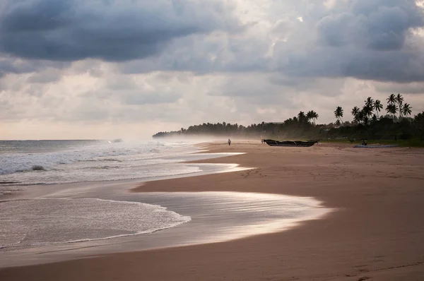 View of coast line in Koggala, Sri Lanka, boulders in the Indian