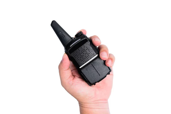 A kéz egy ember, aki egy adó-vevőre vagy walkie-talkie-talkie.on Pünkösd — Stock Fotó
