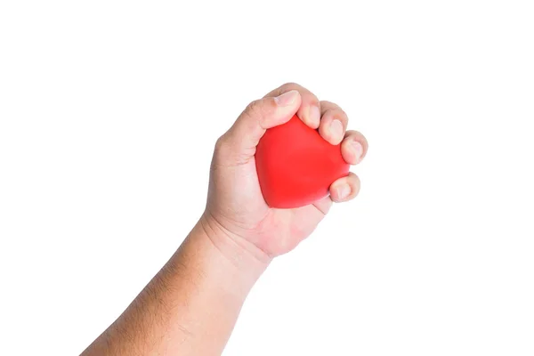 El concepto de amor o salud, con un corazón rojo en la mano. Expandir — Foto de Stock