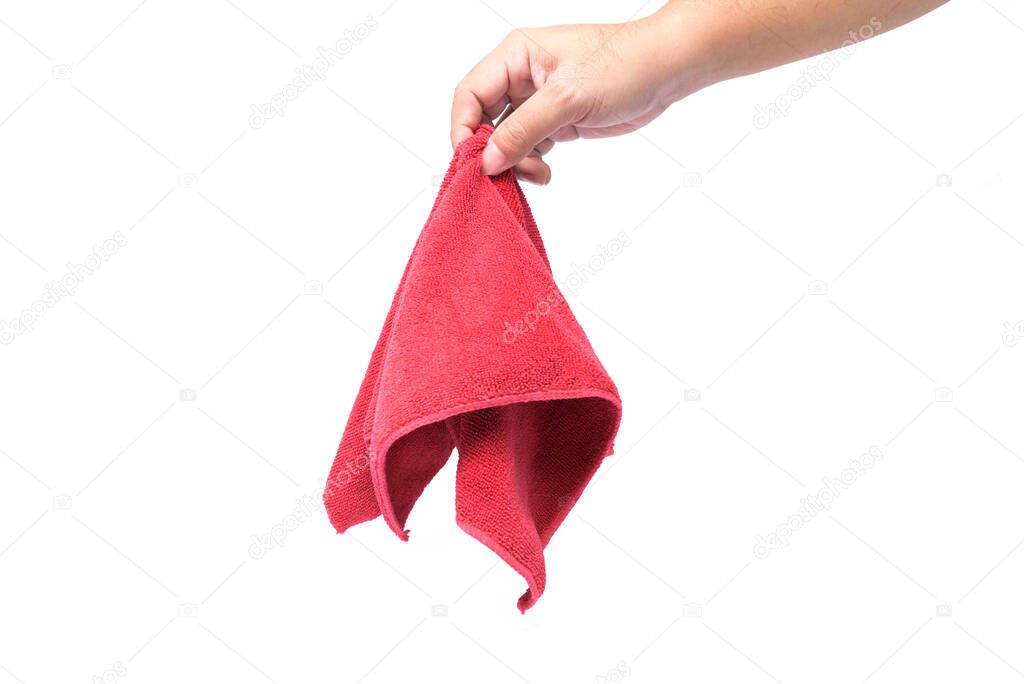 A man's hand is holding a red rag on white background or isolated