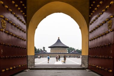 Beijing, China - May 26, 2018: The iconic hot-spot view of traveler walking to sea around Imperial Vault of Heaven, Huangqiongyu at The Temple of Heaven in Beijing, China.  clipart