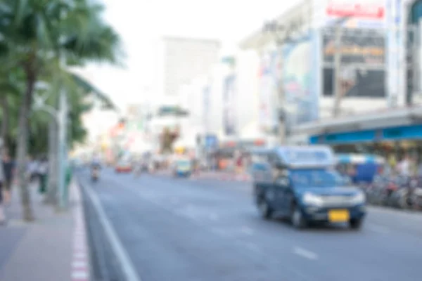 Blurred background of road traffic in Pattaya, Thailand with the local public transportation — Stock Photo, Image