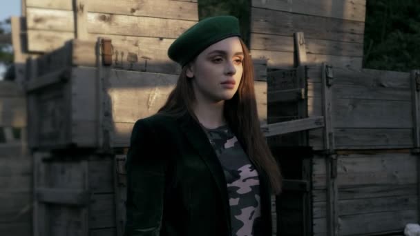 Young Woman Green Beret Standing Wooden Boxes Countryside — Stock Video