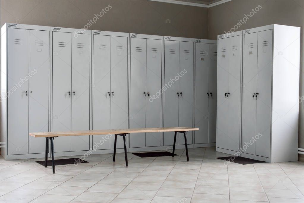 Dressing room with metal drawers and benches