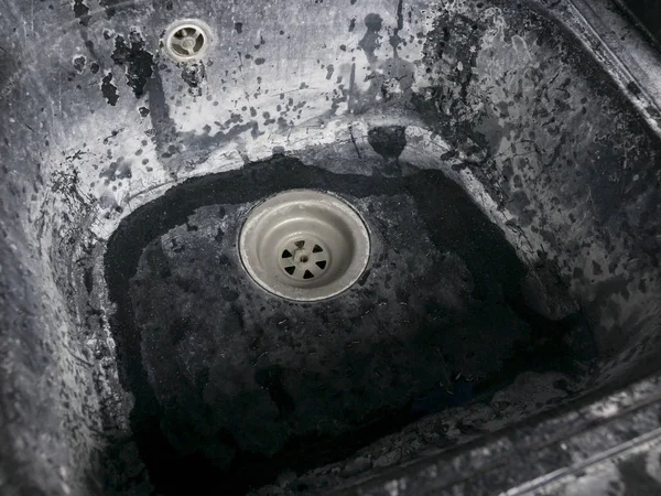 Very rusty black sink closeup — Stock Photo, Image
