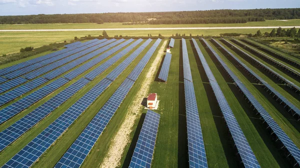 Solar energy farm producing clean renewable energy from the sun . Thousands of solar panels, Photovoltaic solar cells , huge solar farm.