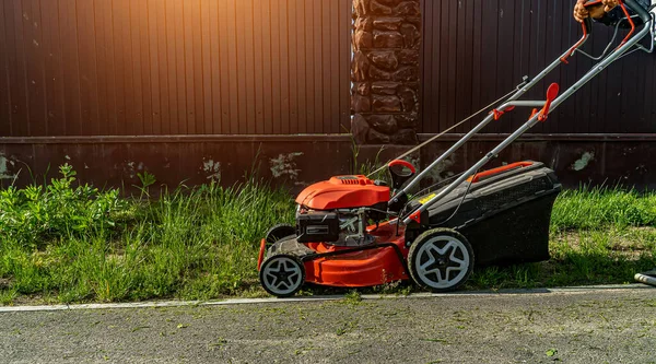 Lawnmower Mows Grass Fence — Stock Photo, Image