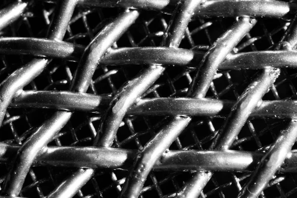 Black and white close up shot of microphone mesh — Stock Photo, Image