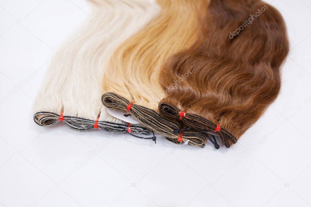 Natural hair for extensions in tapes. Different colors.